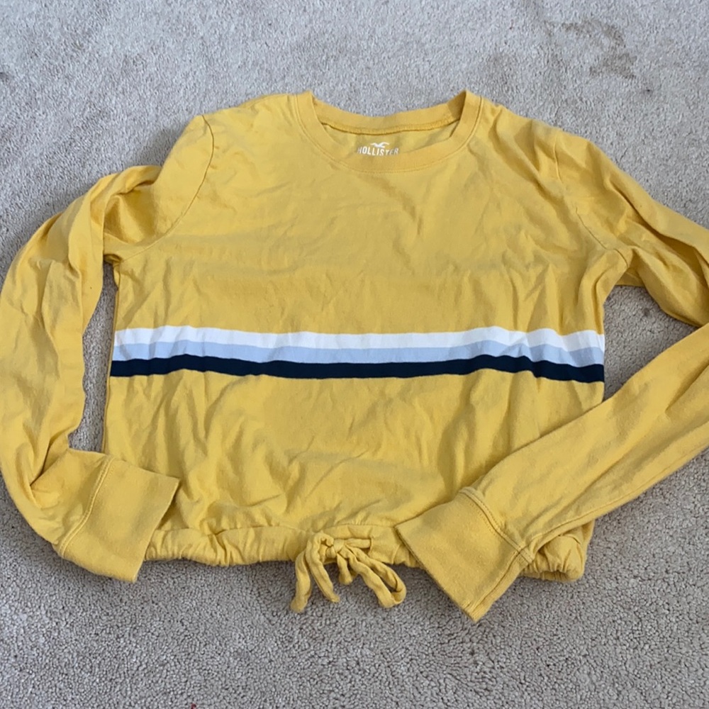 yellow slightly cropped lone sleeve t shirt with tie waist